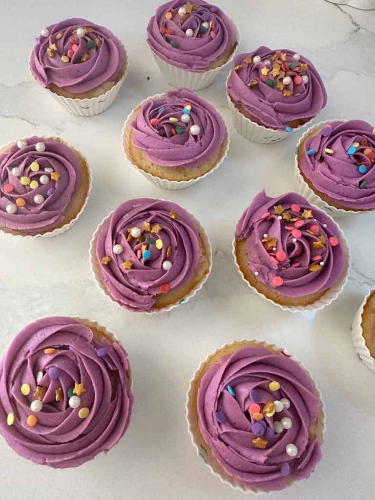 vanilla cupcake with purple frosting