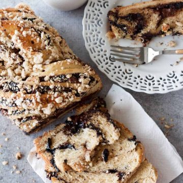 The contrast between the layers of bread and the sticky, delicious swirls of black cocoa, chocolate chips, and cashew nuts make this babka irresistible – It’s difficult to stop at one slice! And while it’s perfect alongside coffee or tea, it is by no means limited to morning consumption and can be all-too-easily eaten as an afternoon snack or dessert.