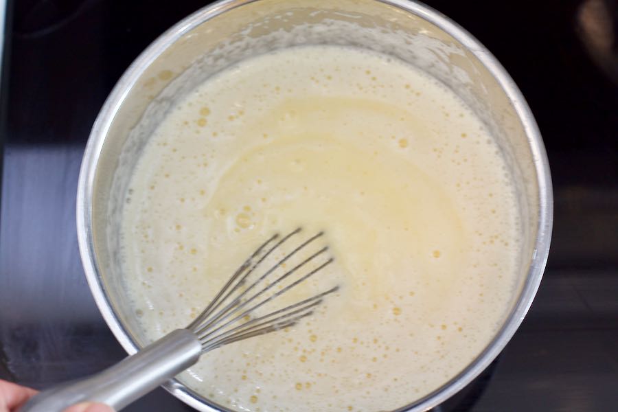 cooking the pastry cream in a saucepan