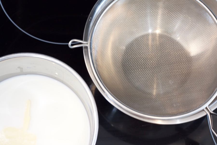 a strainer over a bowl prepared