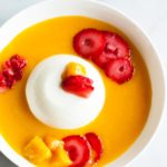 Perfect for a hot summer day – Cold and creamy Mango Summer Smoothie Bowl with Vanilla Panna Cotta! Top it with sliced strawberries and fresh mango chunks, and you’ll have fresh flavors of summer in a bowl! | www.SpoonfulOfButter.com