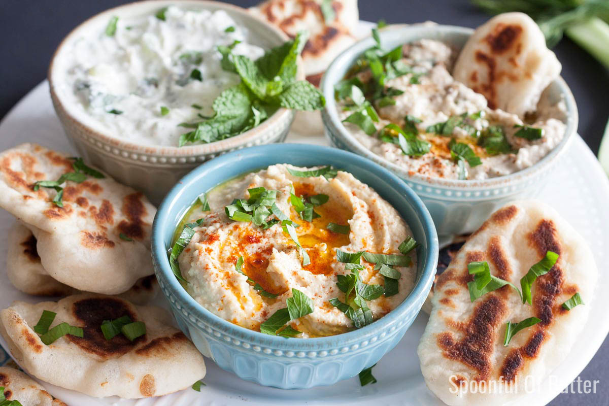 Here's a good basic recipe for hummus. Add your own toppings like roasted garlic, paprika, sun-dried tomatoes. My personal favorite is a drizzle of peri peri sauce! www.SpoonfulOfButter.com