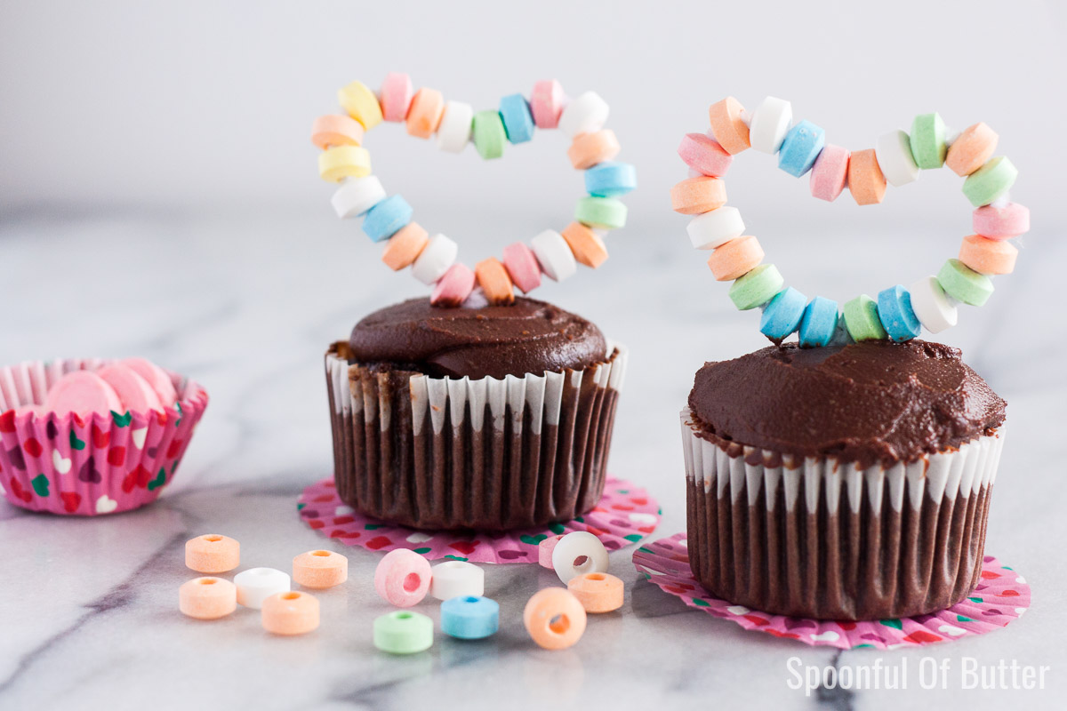 Moist, fluffy chocolate cupcake + luscious whipped caramel frosting + easy DIY heart topper. How cute and delicious is that!