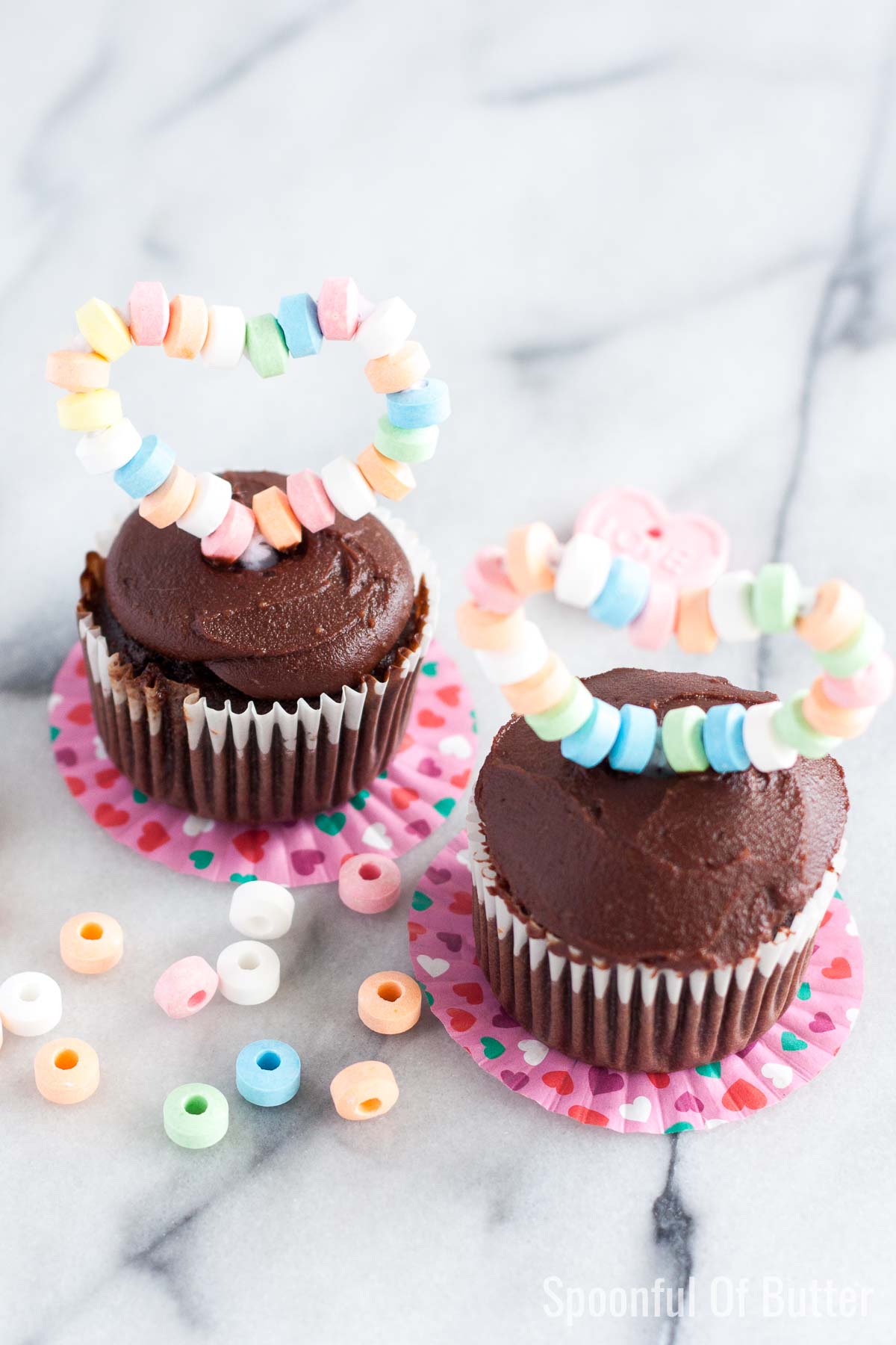 Moist, fluffy chocolate cupcake + luscious whipped caramel frosting + easy DIY heart topper. How cute and delicious is that!