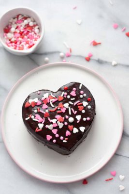 whole ganache heart with a bowl of sprinkles