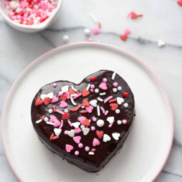 whole ganache heart with a bowl of sprinkles