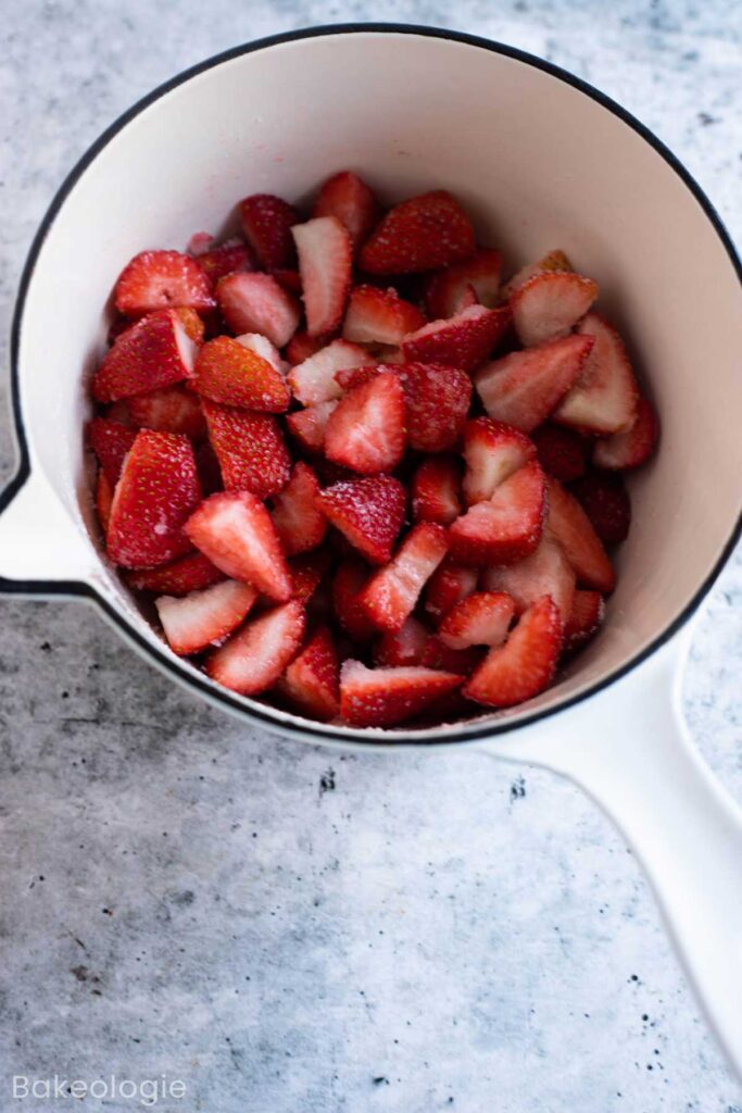 sliced strawberries in a saucepan