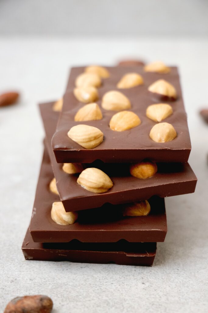 chocolate bar studded with macadamia nuts