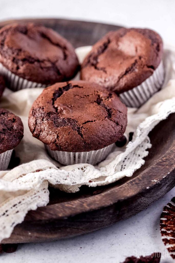 a close-up photo of a triple chocolate muffin