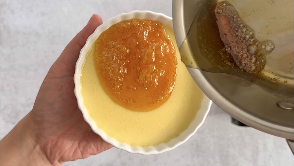 pouring caramel over a creme brulee