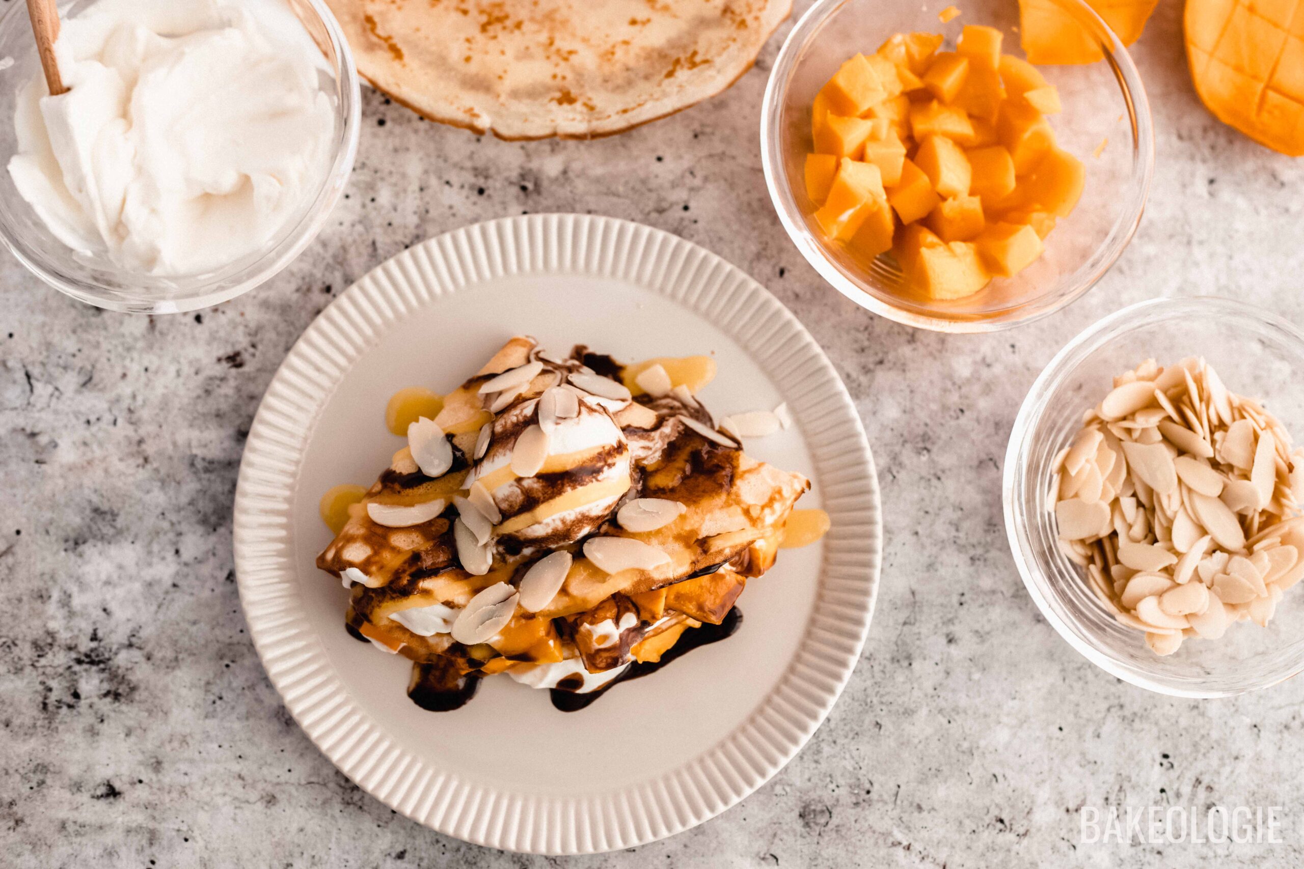 mango crepes on a plate