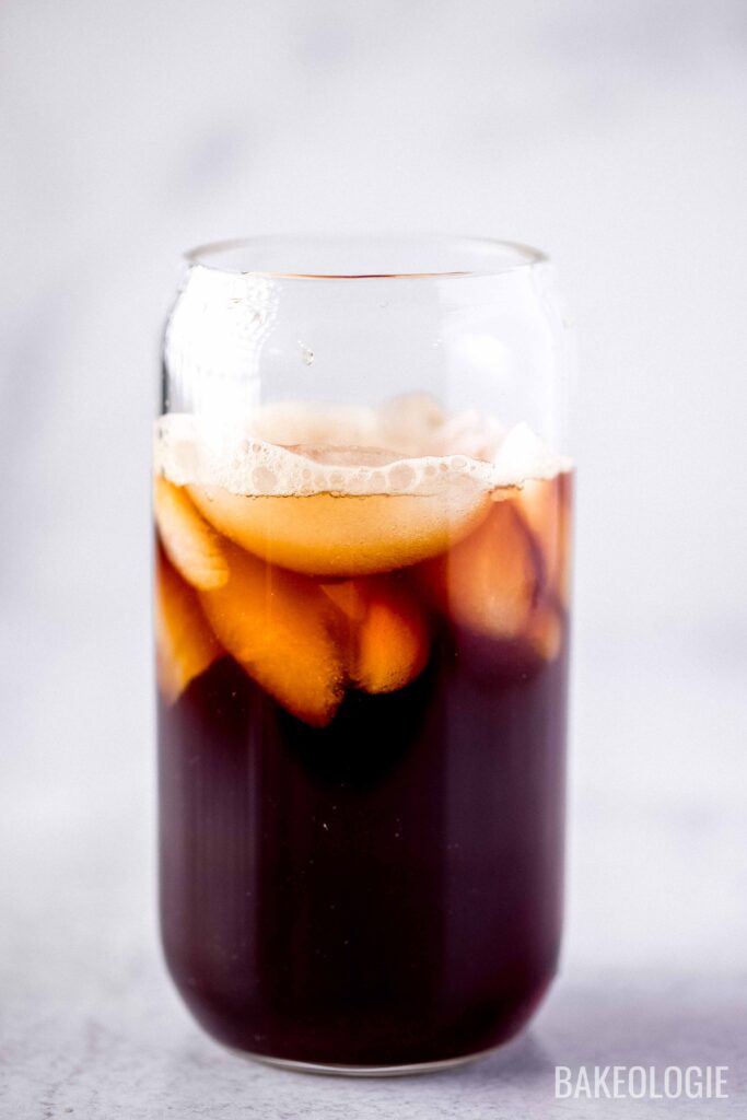 clear glass filed with iced cold brew coffee