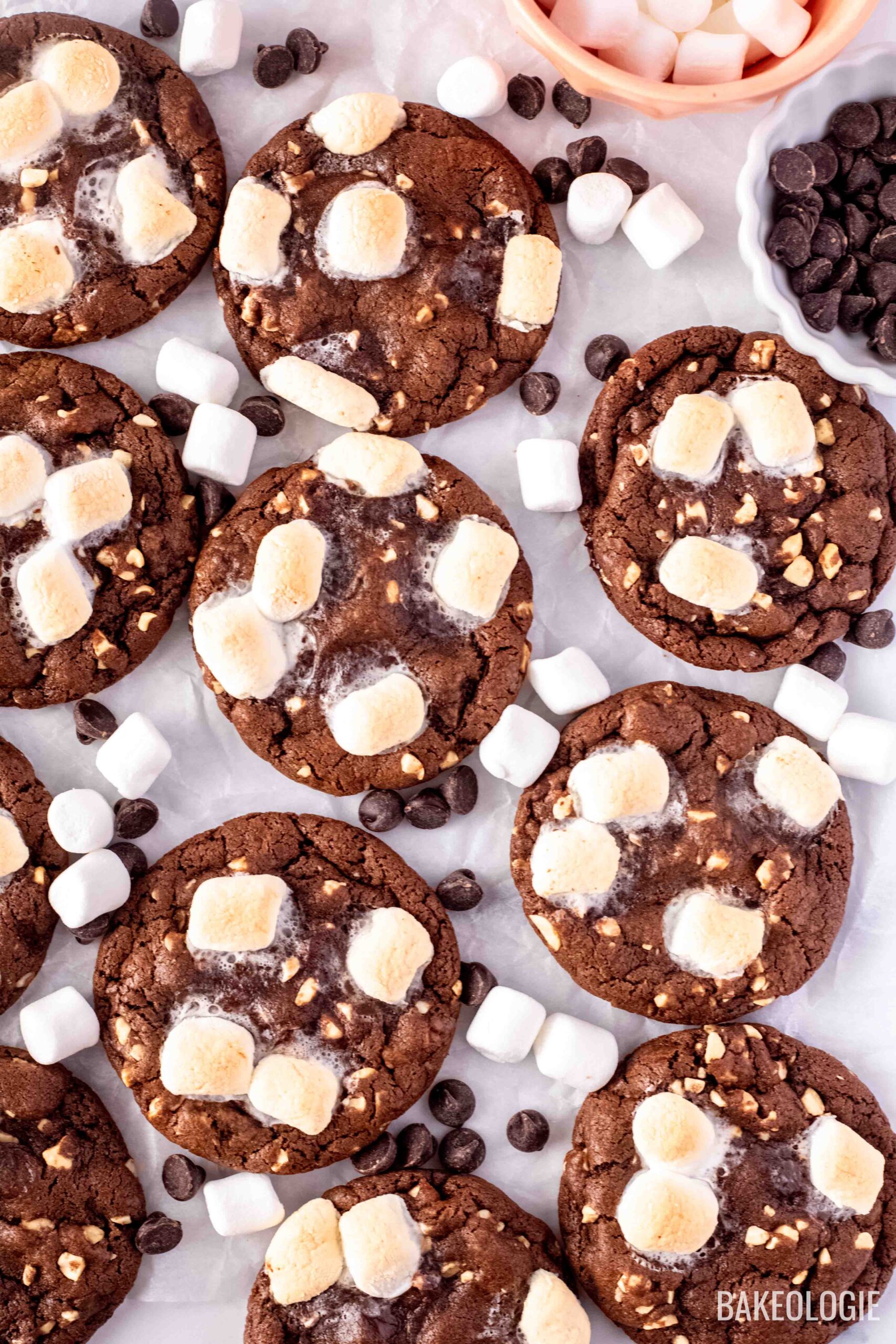rocky road cookies with a bowl of mini marshmallows and chocolate chips