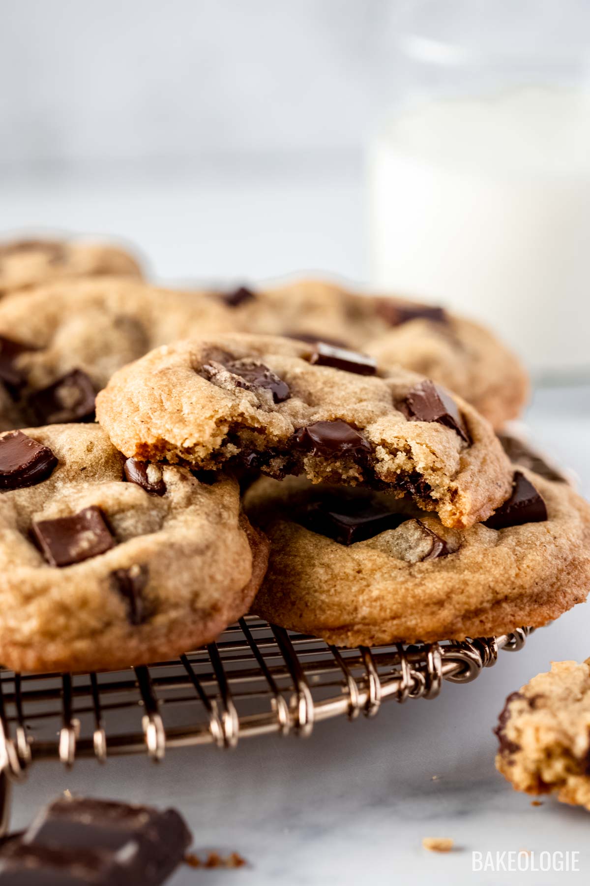 a pile of salted chocolate cookie with a bite