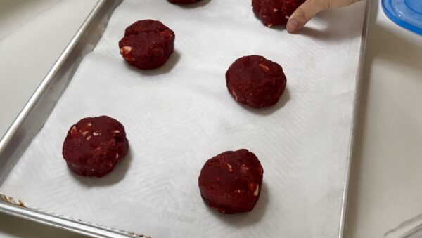 frozen red velvet cookie dough on a tray