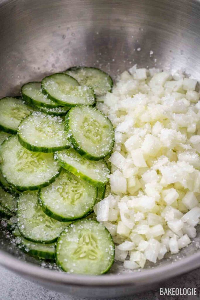 Sliced cucumbers and diced onions sprinkled with salt to draw out moisture