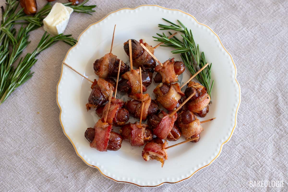 Bacon-wrapped dates stuffed with Brie and finished with maple glaze